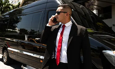 Professional chauffeur providing black car service in Frisco Texas